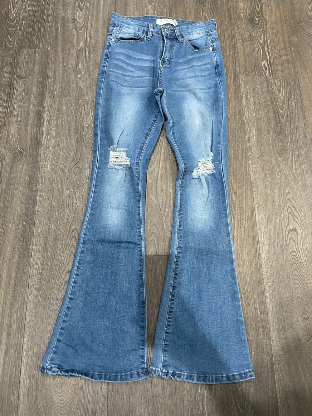Distressed Light Blue Flare Jeans - Womens